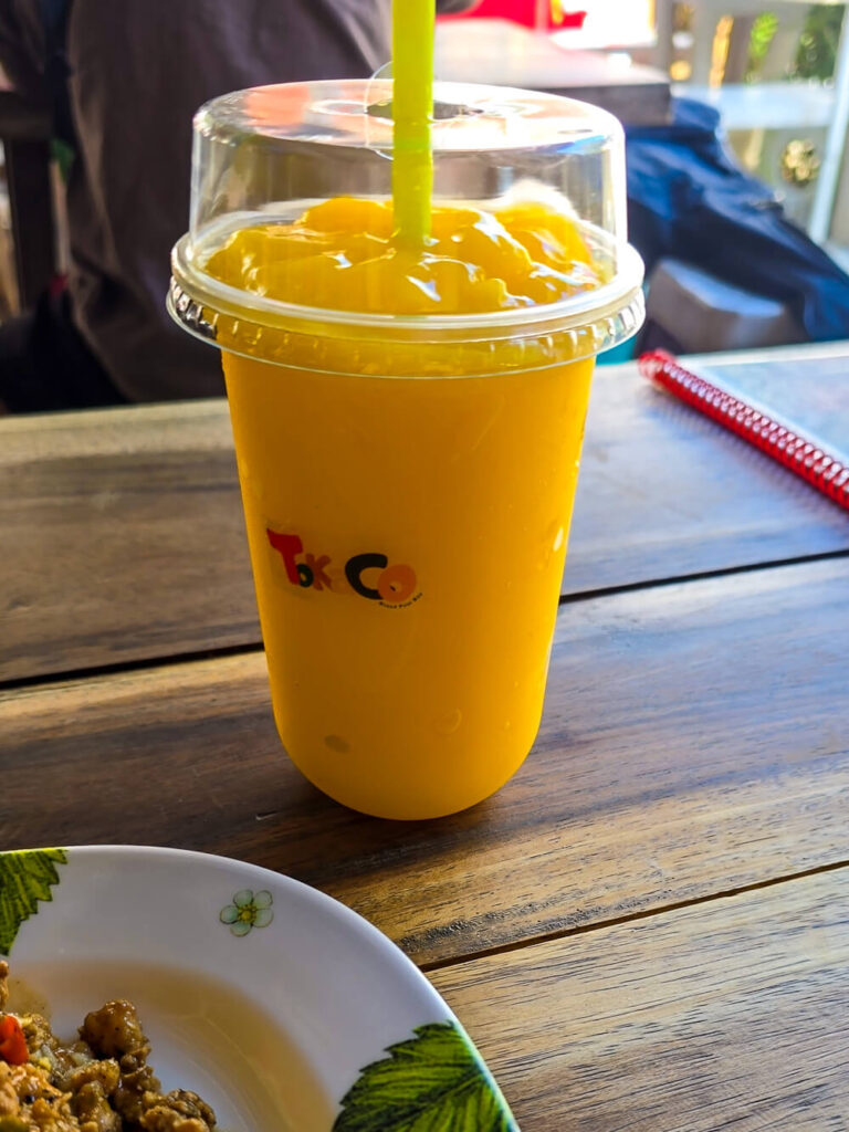 A 35 THB fresh mango smoothie bought from a local street vendor in Chiang Mai.