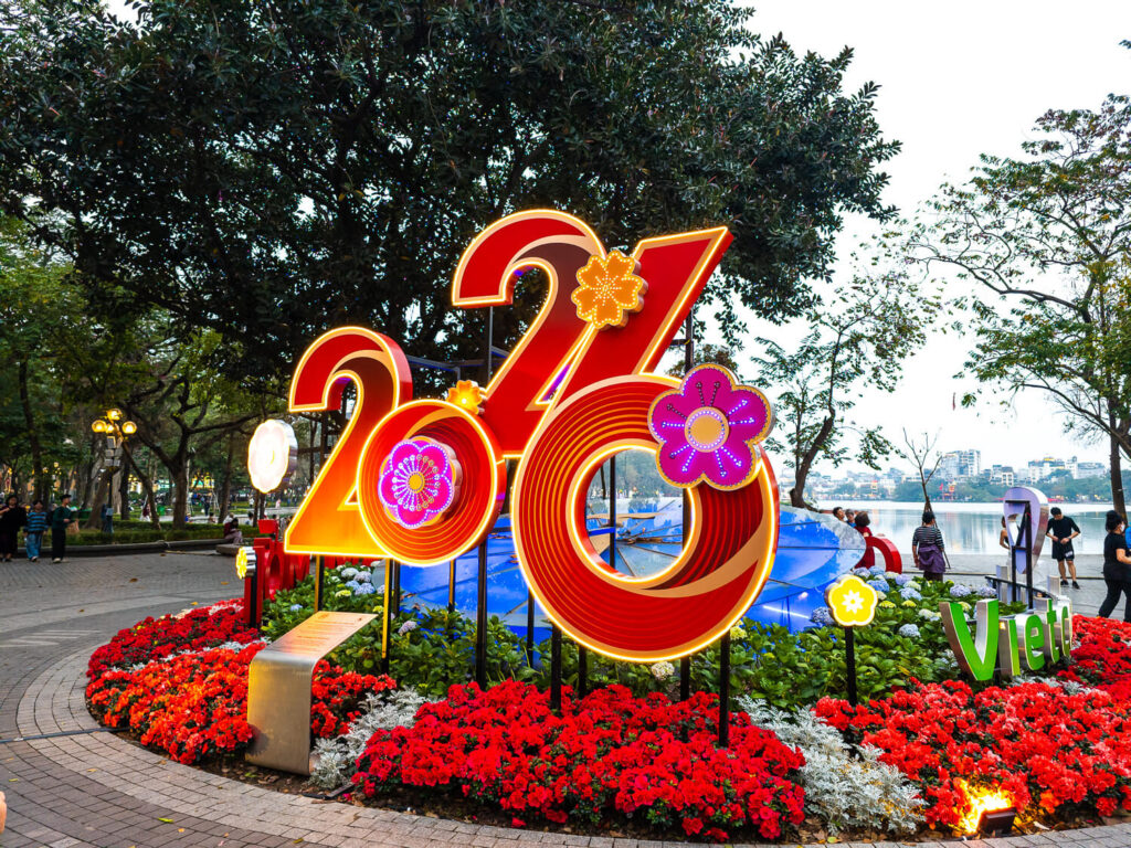 A colorful floral 2026 new year decorative display set up near Hoàn Kiếm Lake for the Tet holidays.