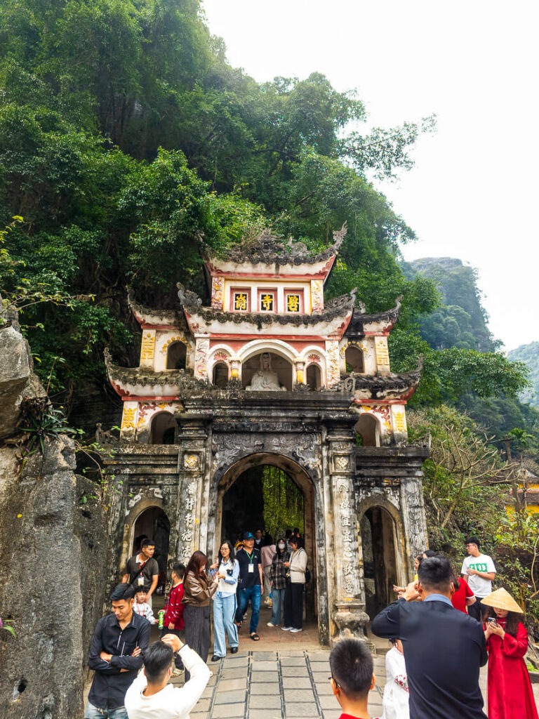 Close up of the weathered stone steps and traditional temple architecture at Bich Dong Pagoda in Ninh Binh.