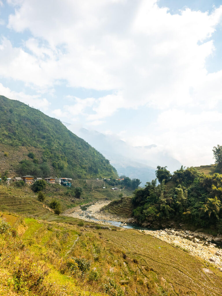 A sweeping view of the Muong Hoa Valley rice terraces and mountain peaks during a solo trek.