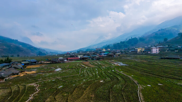 A stunning drone view of lush green landscapes in Vietnam, the ultimate travel destination featured in this complete Vietnam e-Visa guide.