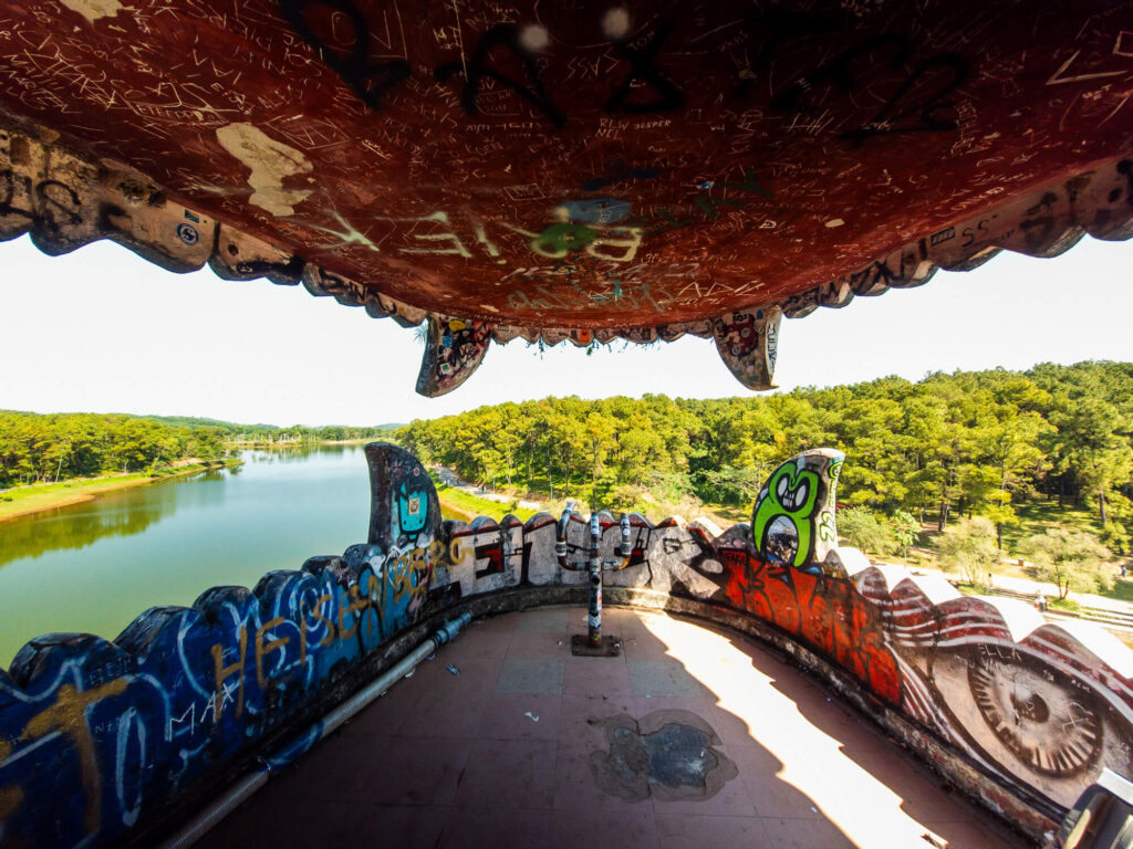 Looking out over the lake and forest from inside the mouth of the decaying dragon structure