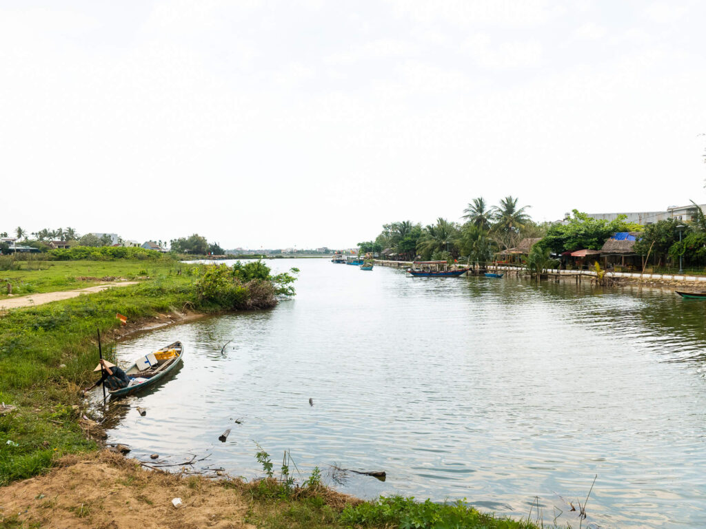 Empty local wooden boats floating in the water near the tranquil islands.