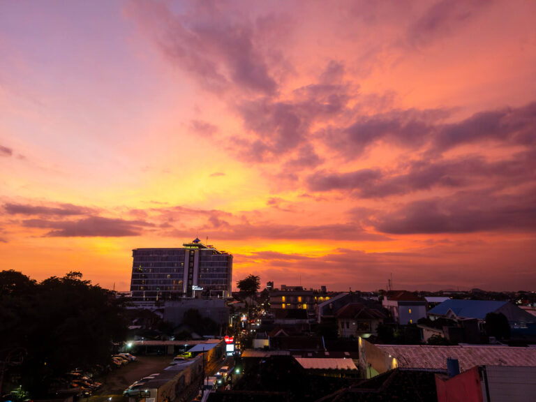 A view of a local hotel from a hostel in the Tugu area, highlighting exactly where to stay in Yogyakarta for a convenient trip.